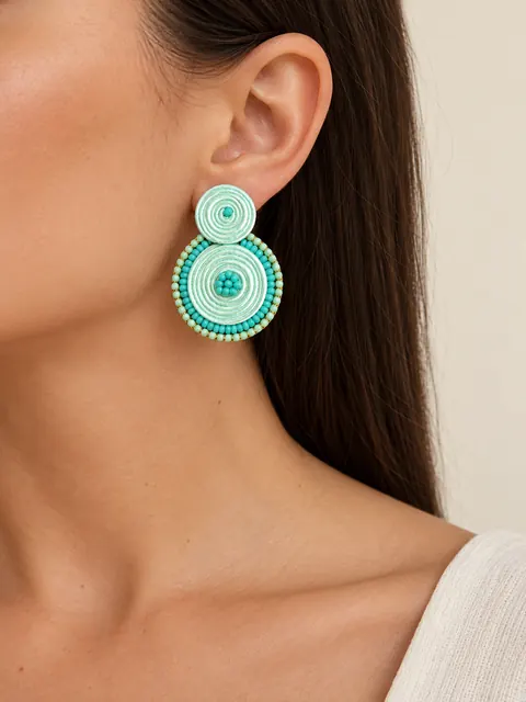 Pendientes Caracola en menta de Ann Estacio